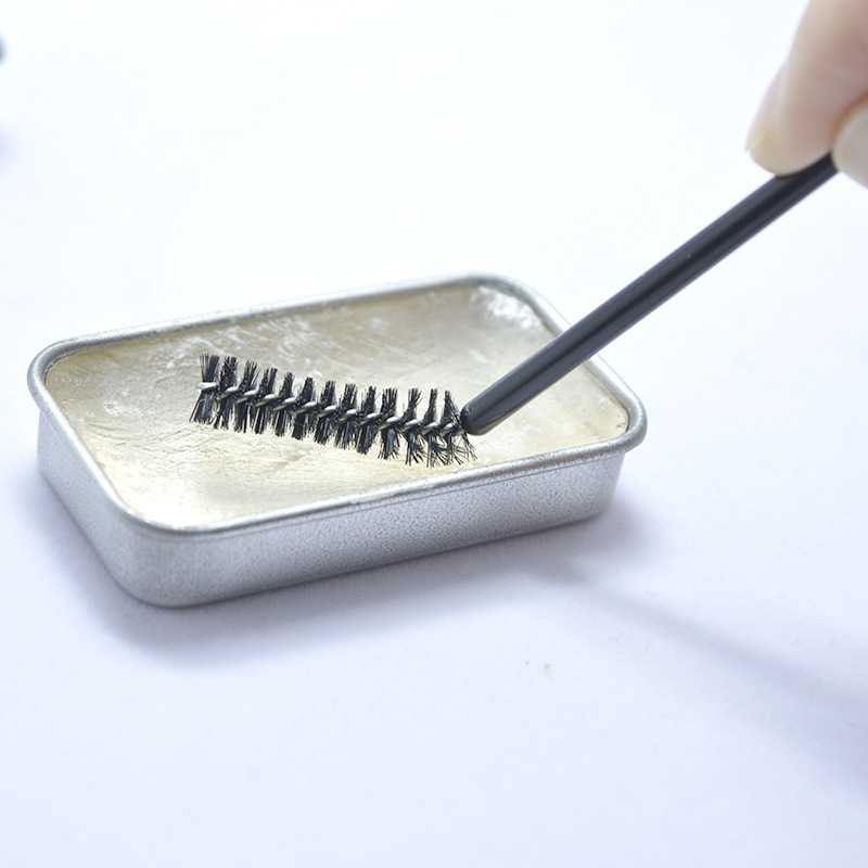 Eyebrow shaping eyebrow wax + brush