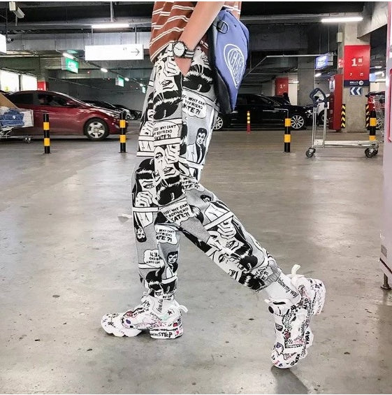 Tide brand hip hop newspaper pants men and women pants ins the same paragraph street loose beam pants national tide