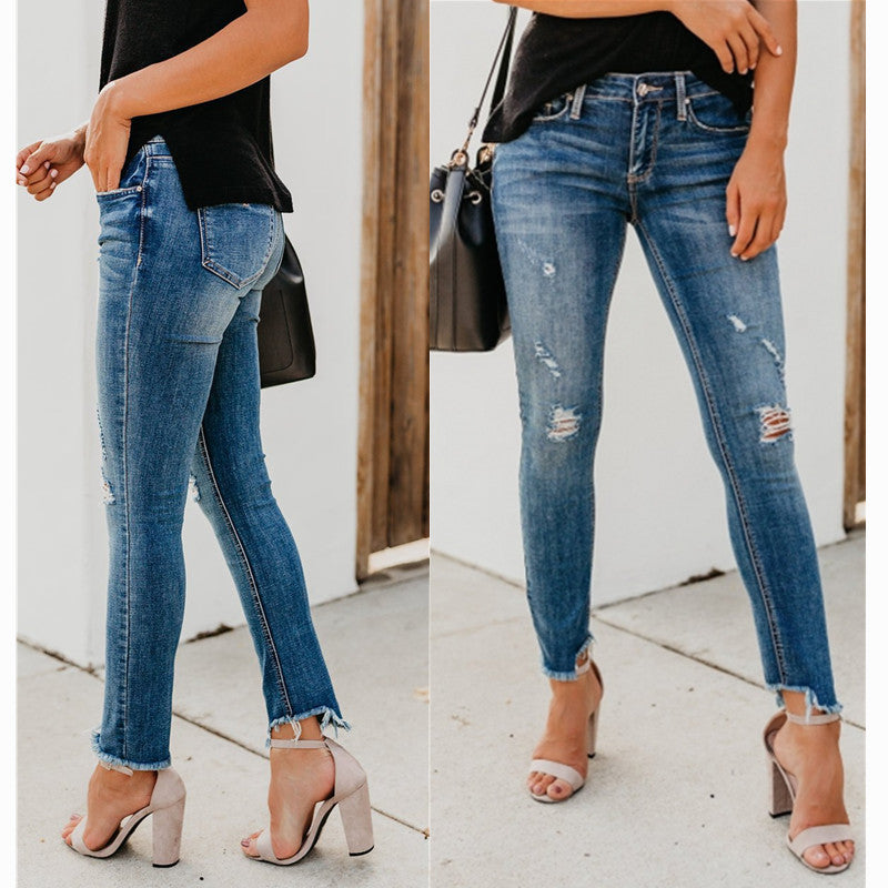 Stretch jeans with holes