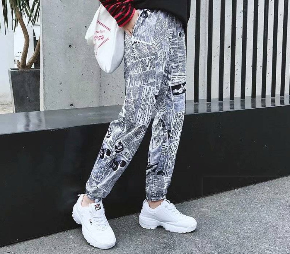 Tide brand hip hop newspaper pants men and women pants ins the same paragraph street loose beam pants national tide