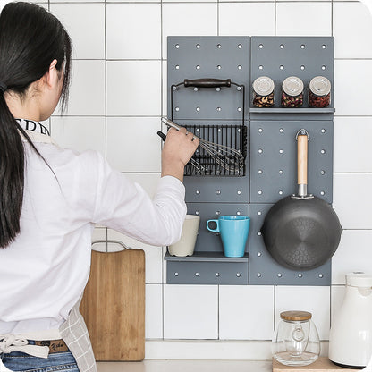 Simple wall-mounted plastic hole plate storage rack