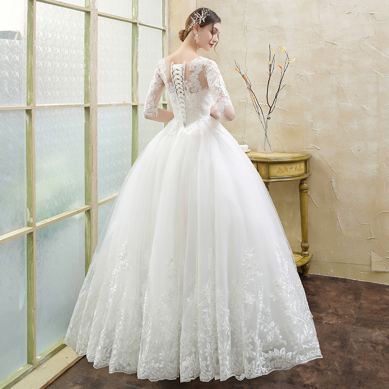 Bride's long-sleeved forest lace tail wedding dress