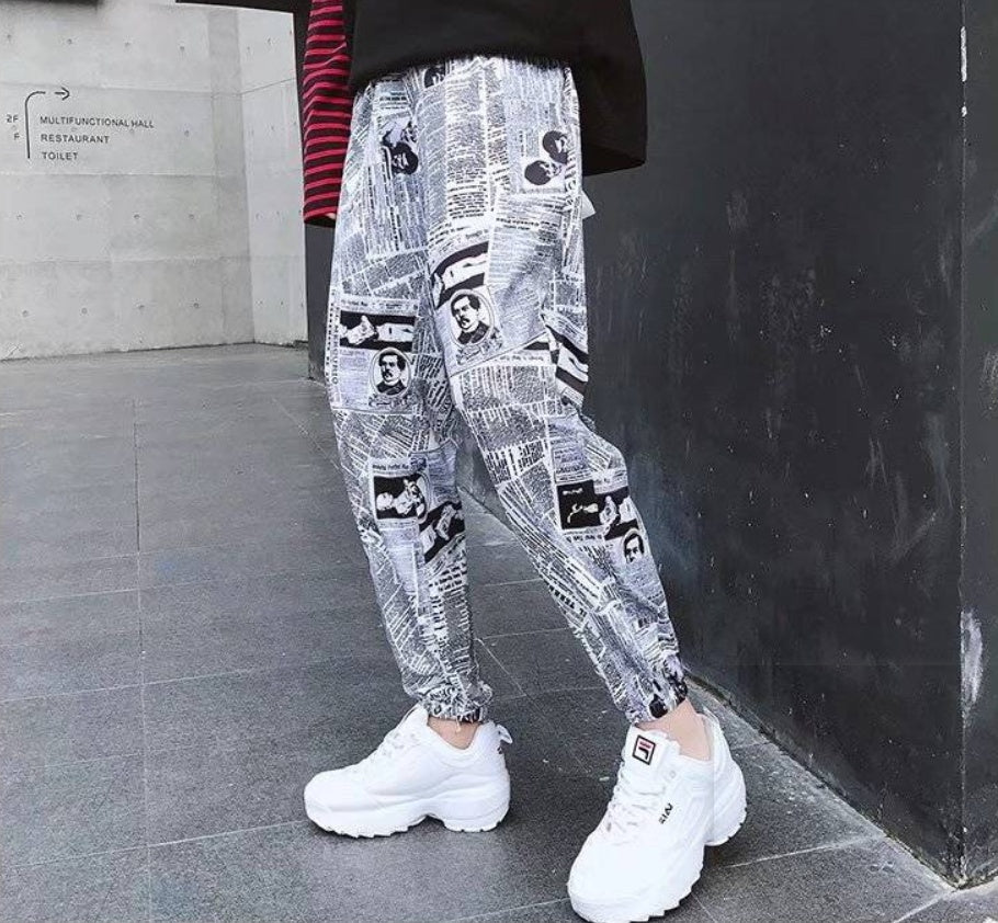 Tide brand hip hop newspaper pants men and women pants ins the same paragraph street loose beam pants national tide