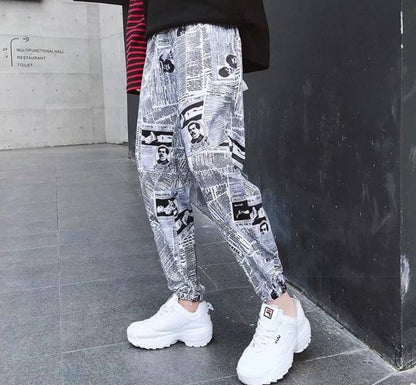 Tide brand hip hop newspaper pants men and women pants ins the same paragraph street loose beam pants national tide