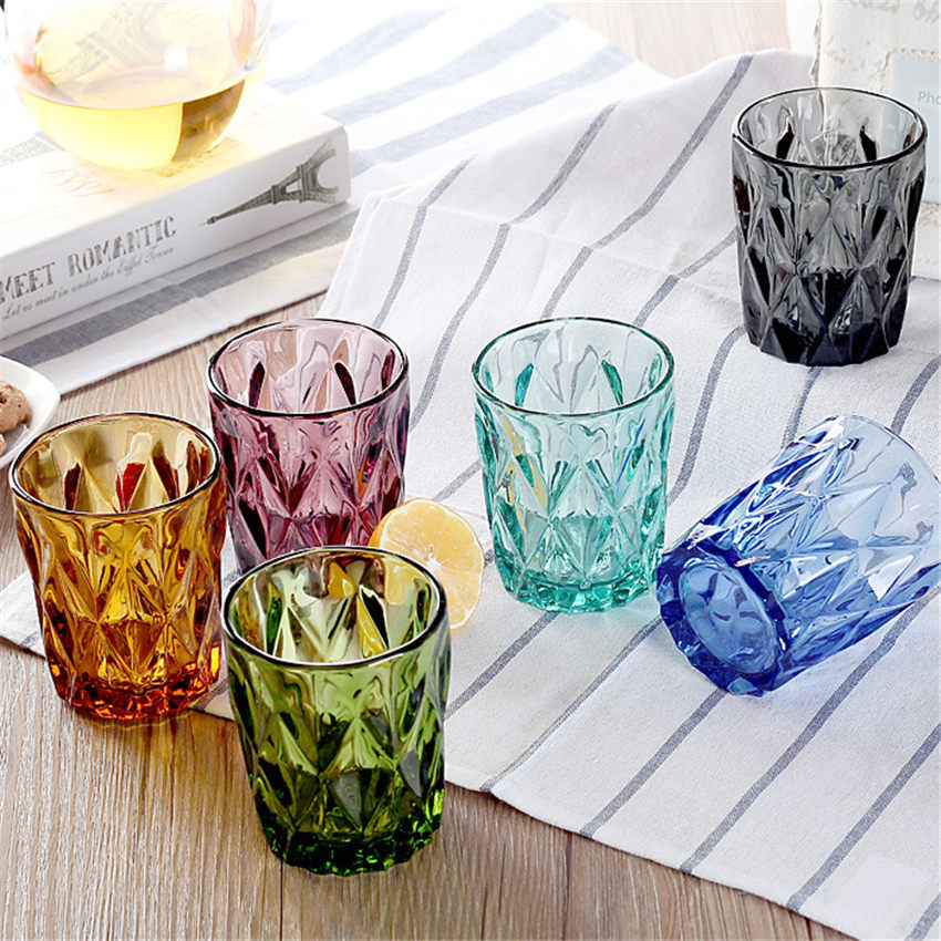 Creative colored relief glass cup on trumpet