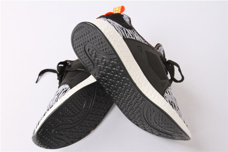 Flying weaving running shoes