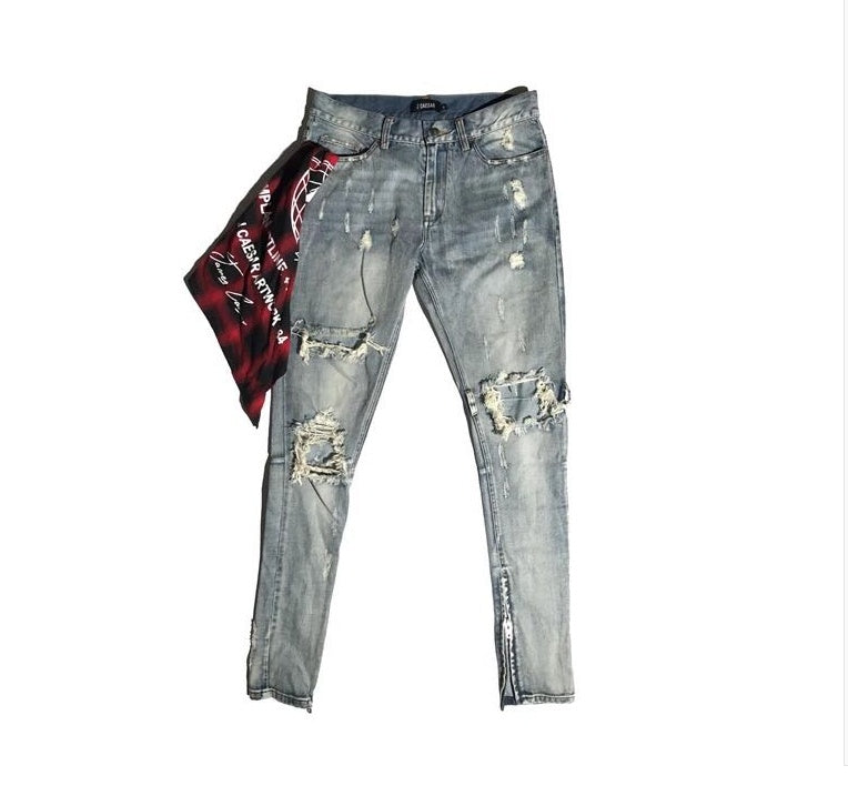 Washed holes in jeans, men and women GRE hip hop street trend stars with the same paragraph