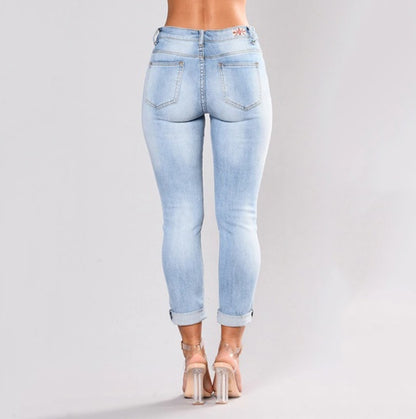 Black jeans with embroidered feet