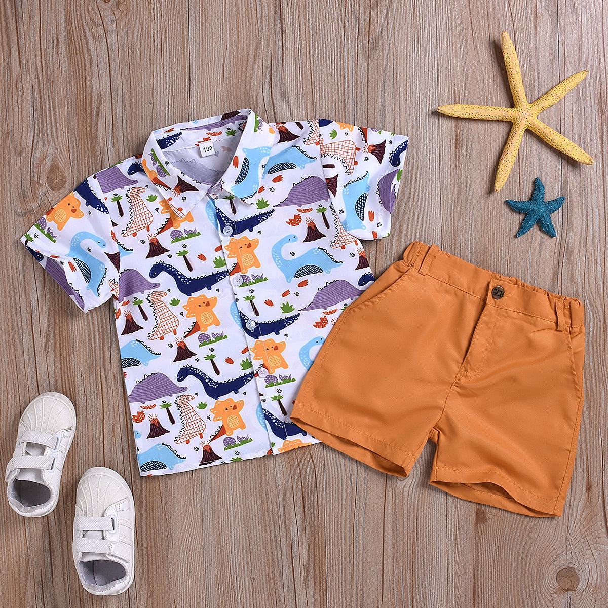 Boy's dinosaur print short sleeve suit