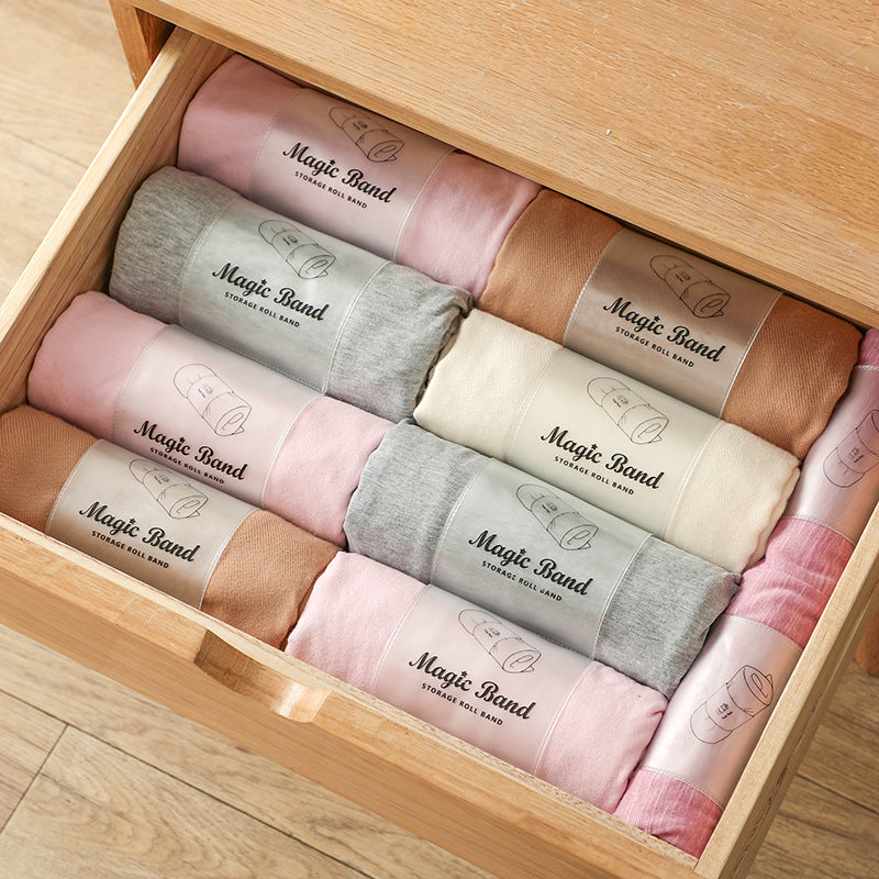 Self-adhesive Strapping Of Clothes Rolls For Storage