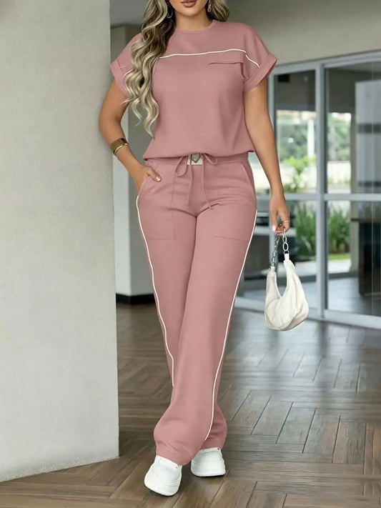 New Spring‑Autumn Women’s Color‑Contrast Stitching Two‑Piece Outfit. Crew‑neck short‑sleeve top with decorative pockets, drawstring high‑waist wide‑leg trousers with side practical pockets. Made of stretchy &
