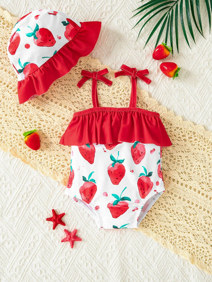 Cute 3-18M baby girl strawberry one-piece swimsuit set with matching sun hat. Watercolor strawberry print, ruffle hem & shoulder