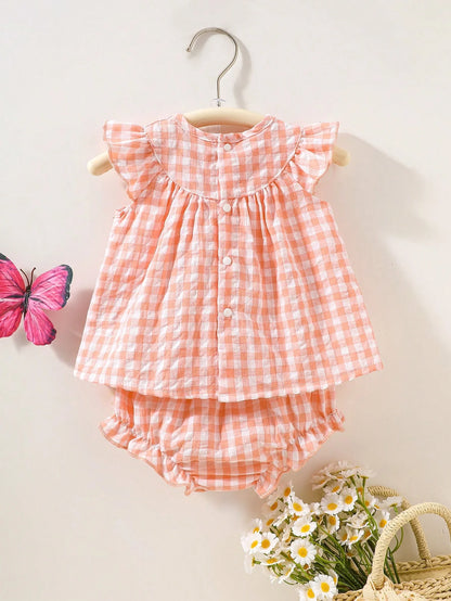 Newborn baby girl two-piece set: white cotton pleated sleeveless checkered top and matching triangular leggings