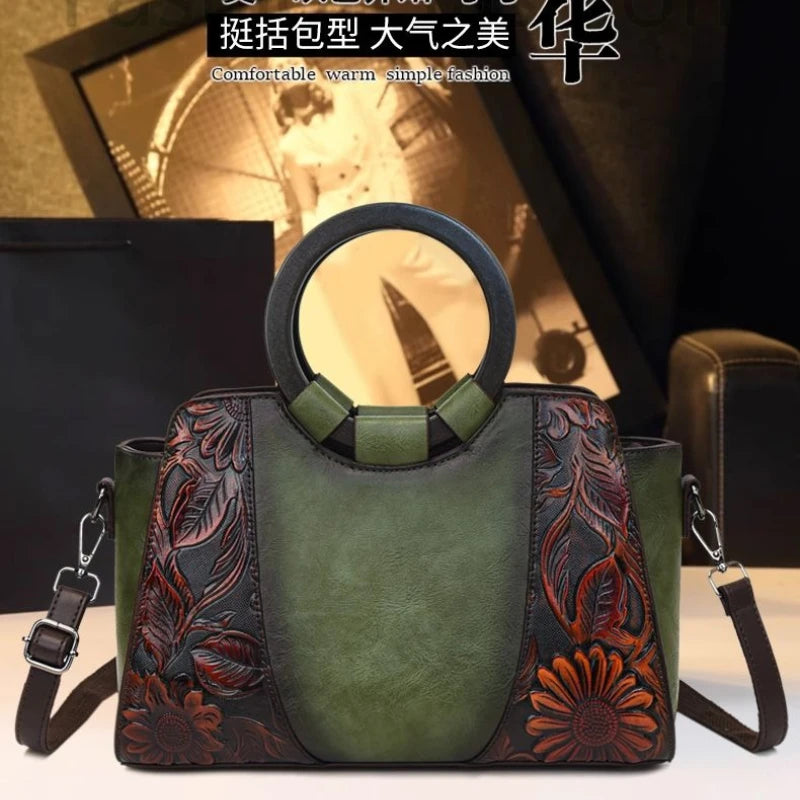 2026 New Vintage Chinese Leather Carved Leather Handbag Women Embossed Versatile Cheongsam One-shoulder Crossbody Mother Bag