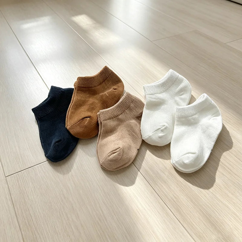 5 pairs of soft fabric baby socks in caramel color for infants and toddlers, suitable for babies aged 0-1 years, featuring boat-