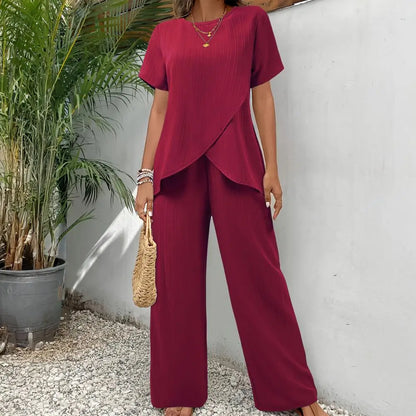 2026 Casual Solid Suit Women Summer Fashion Round Neck Short Sleeve Irregular Split Top Elastic Waist Trousers Two Piece Set
