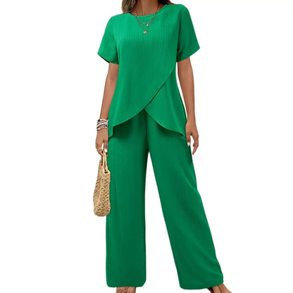 2026 Casual Solid Suit Women Summer Fashion Round Neck Short Sleeve Irregular Split Top Elastic Waist Trousers Two Piece Set