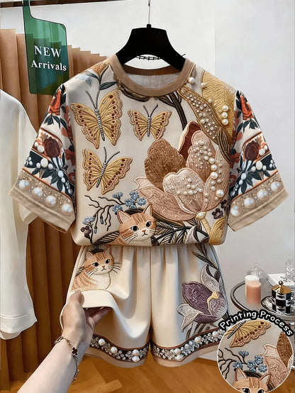Women's Summer Casual Outfit: Elegant Floral Butterfly and Kitten Print Short-Sleeve Top + Loose Shorts Two-Piece Set, Suitable for Summer Casual Outings, Versatile Clothing