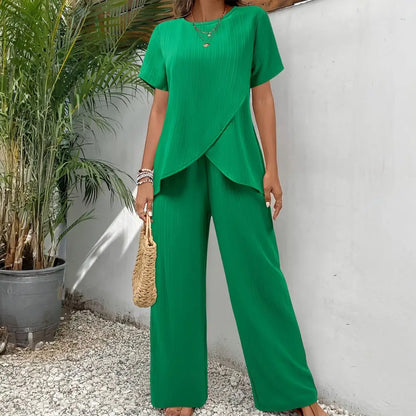 2026 Casual Solid Suit Women Summer Fashion Round Neck Short Sleeve Irregular Split Top Elastic Waist Trousers Two Piece Set