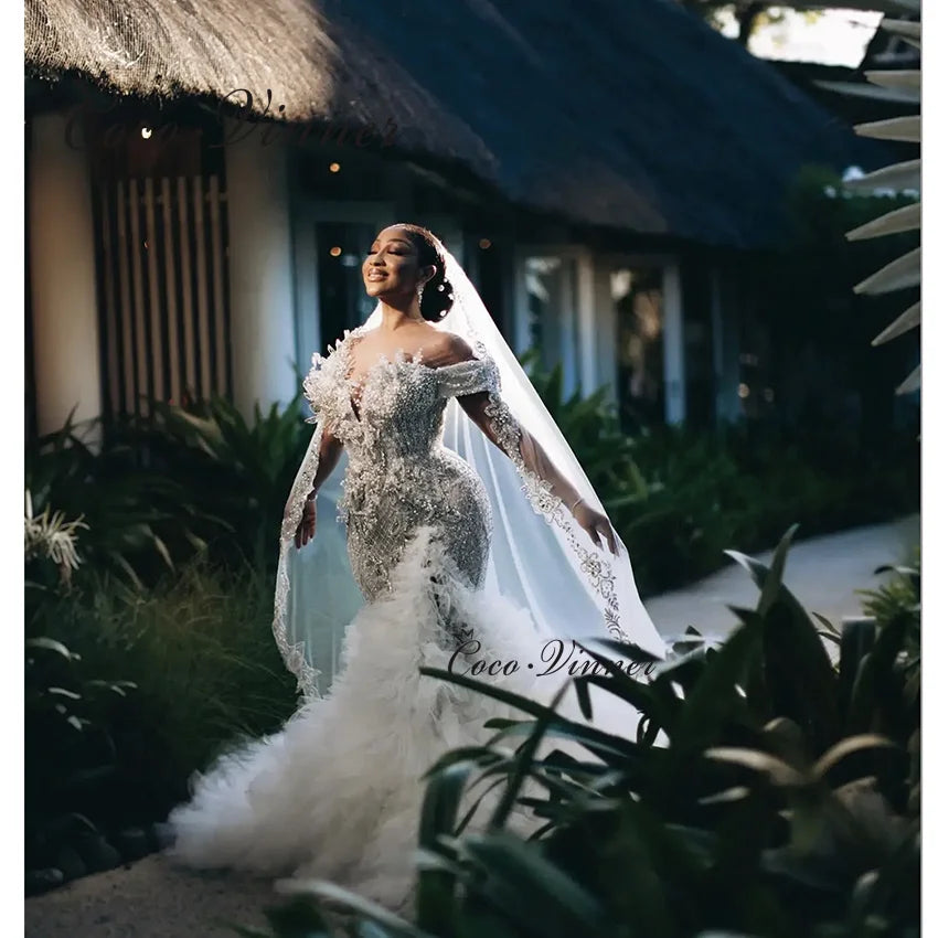 Customized Luxury Beading Mermaid Wedding Dress 2026 New Off The Shoulder Tulle Rufflus Africa Mermaid Wedding Dresses W1426