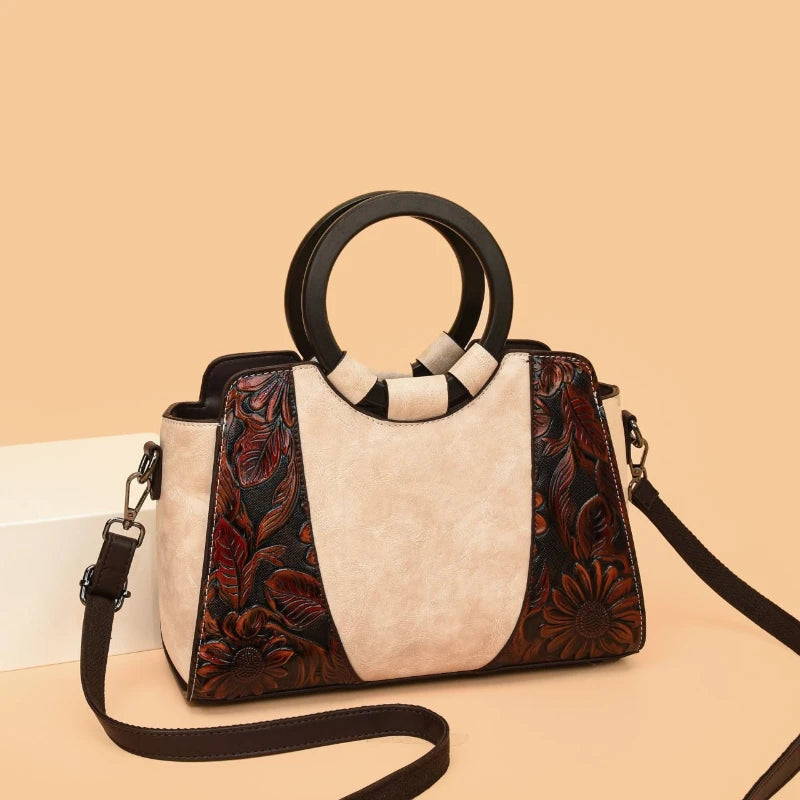 2026 New Vintage Chinese Leather Carved Leather Handbag Women Embossed Versatile Cheongsam One-shoulder Crossbody Mother Bag