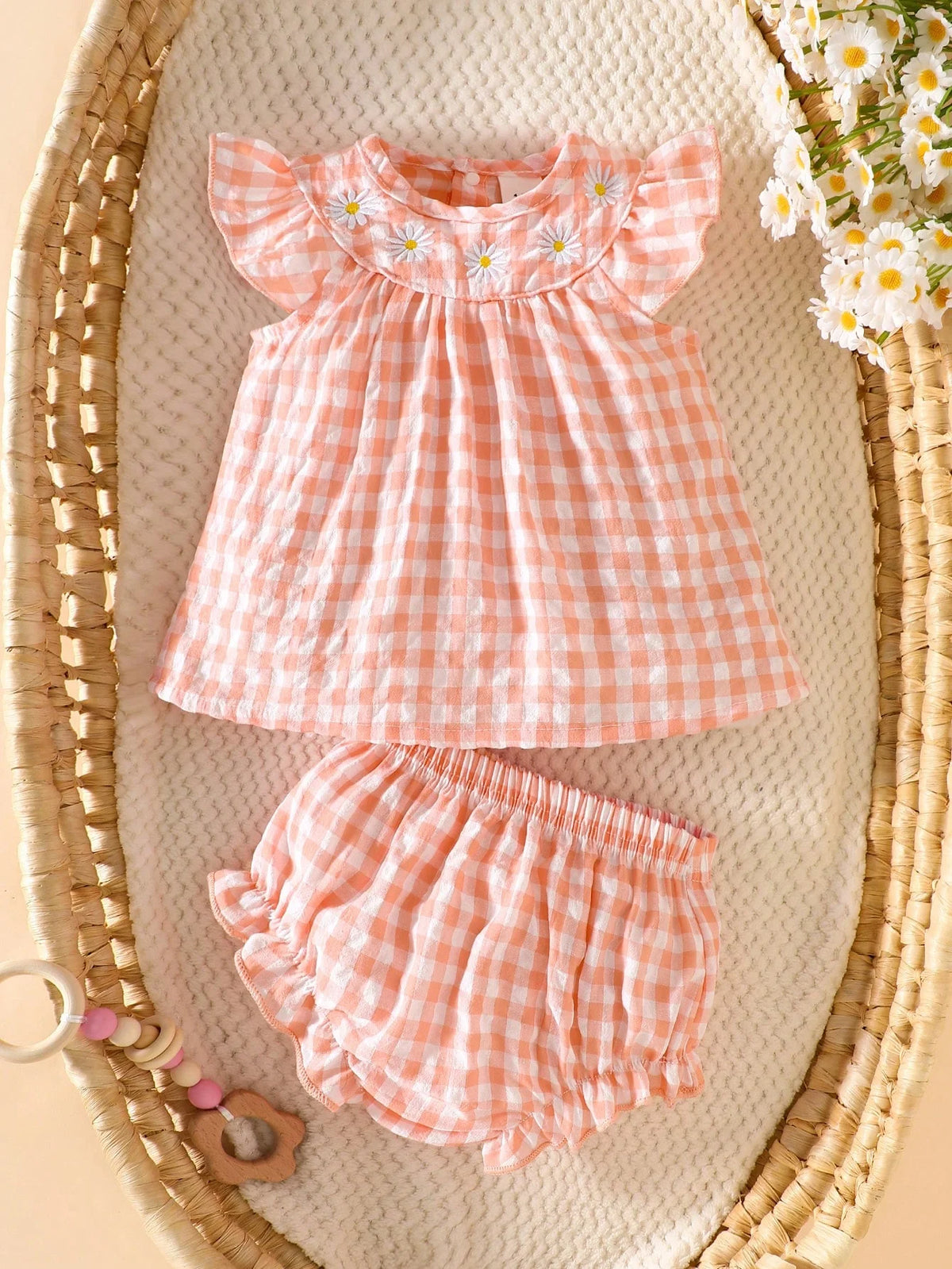 Newborn baby girl two-piece set: white cotton pleated sleeveless checkered top and matching triangular leggings