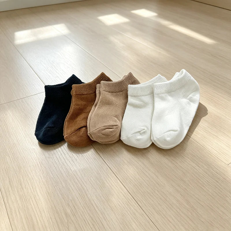 5 pairs of soft fabric baby socks in caramel color for infants and toddlers, suitable for babies aged 0-1 years, featuring boat-