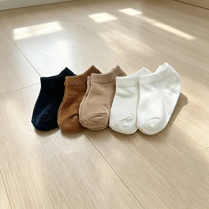 5 pairs of soft fabric baby socks in caramel color for infants and toddlers, suitable for babies aged 0-1 years, featuring boat-
