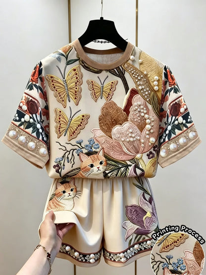 Women's Summer Casual Outfit: Elegant Floral Butterfly and Kitten Print Short-Sleeve Top + Loose Shorts Two-Piece Set, Suitable for Summer Casual Outings, Versatile Clothing