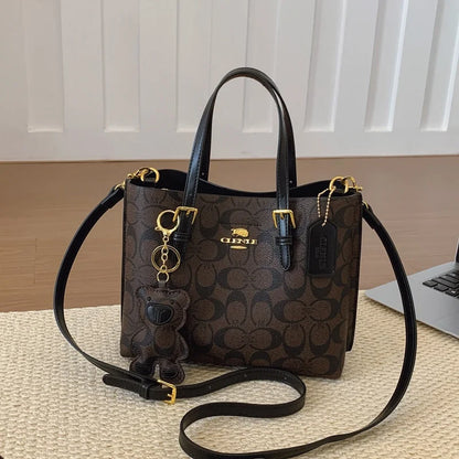 Elegant Monogram Tote Bag in Classic Style for Women Featuring Retro Leather Trim and Detachable Strap