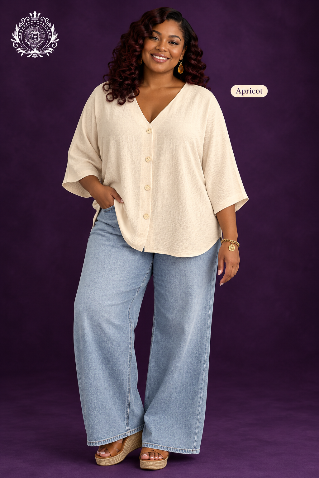 Apricot blouse model with light-wash jeans