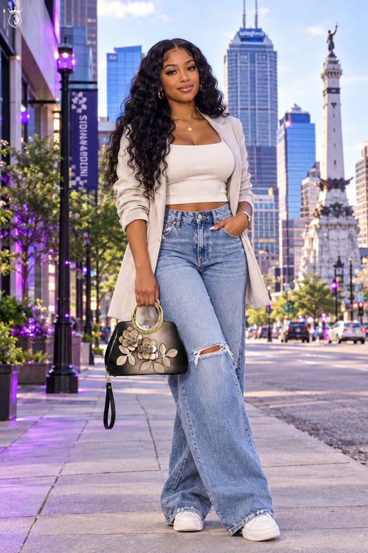 Black American model with correct black-to-bronze ombre floral appliqué bag, Indianapolis skyline