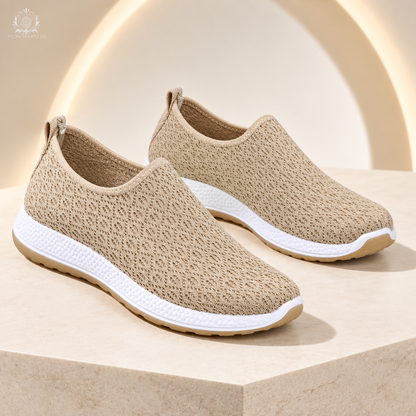 Khaki women’s flats in a bright ivory commercial studio