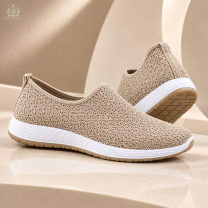 Khaki women’s flats in a cream and sand studio
