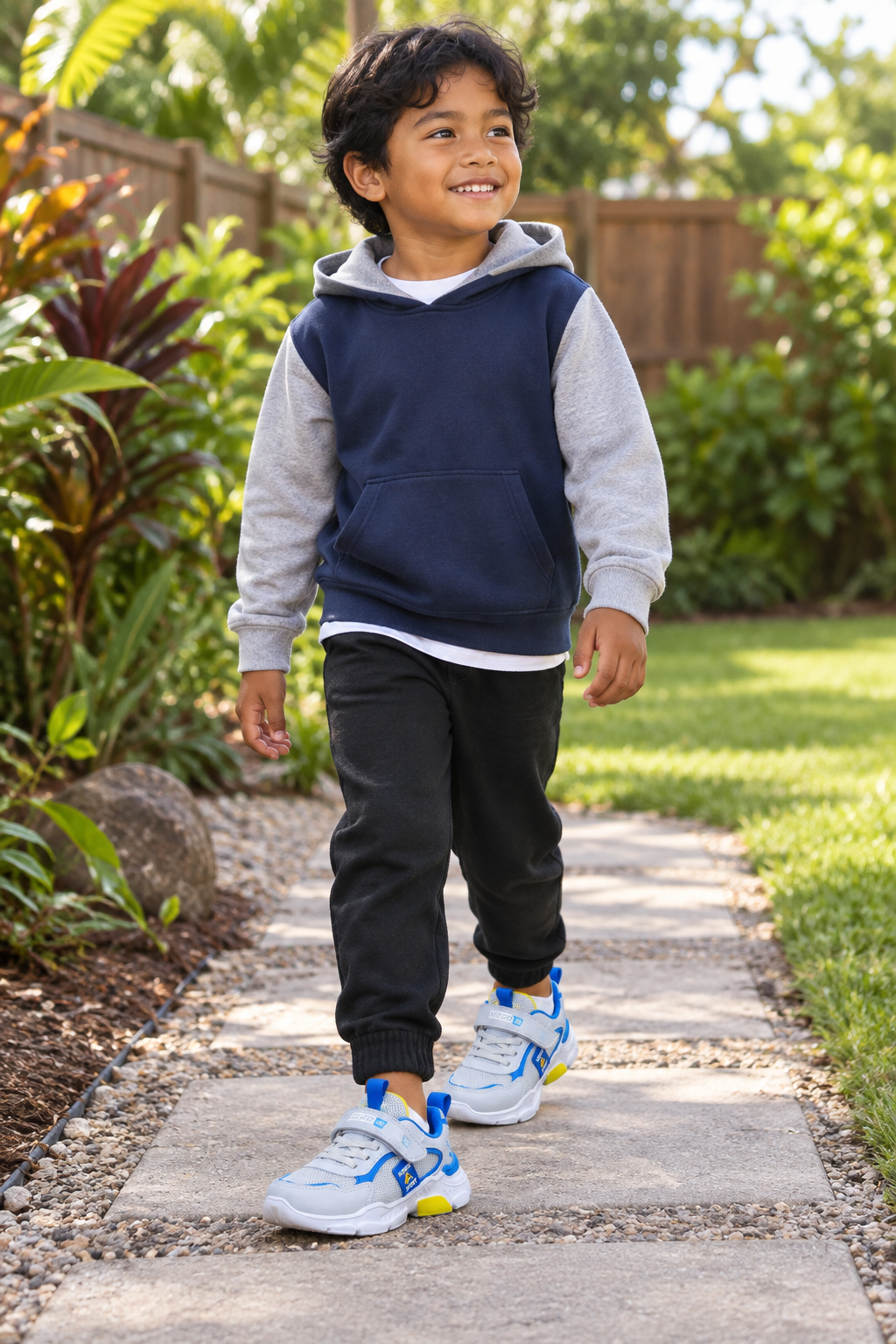 Little boy wearing the shoes from photo 6