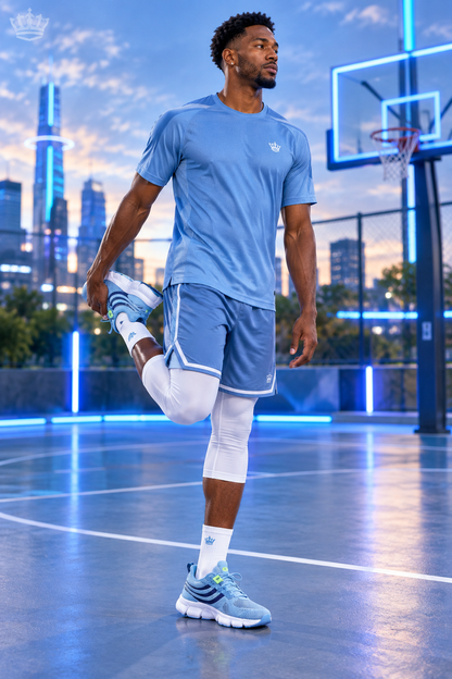 Man stretching in light-blue sneakers